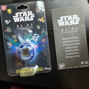 Star Wars Tamagotchi R2-D2 Blue Translucent Hologram Virtual Pet Keychain Game